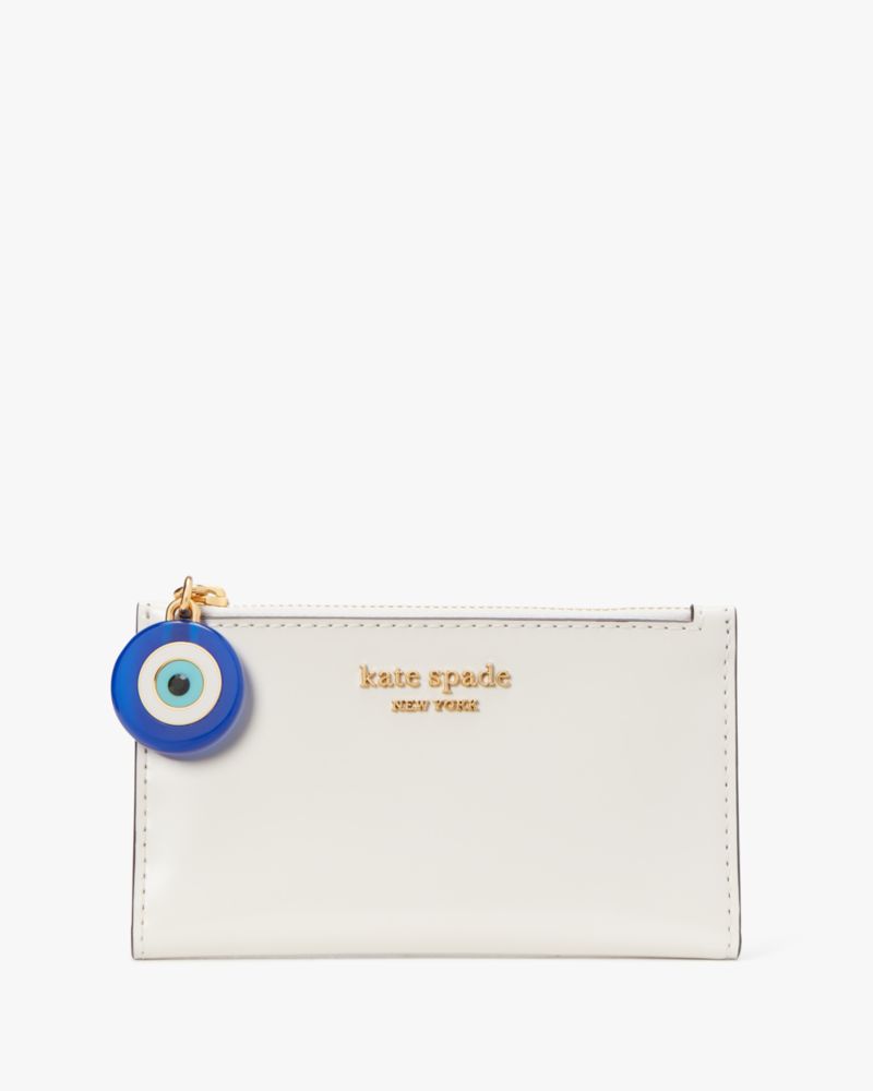 Kate Spade,Evil Eye Small Slim Bifold Wallet,Parchment