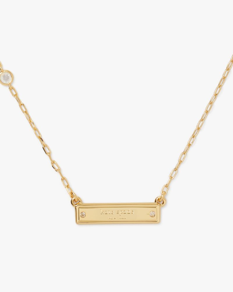 Kate Spade,Sam Icon Bar Pendant,Single Strand,Bar Embellishment,Gem Embellishment,Engraved Detail,Logo,Gold Metal,Work,Clear