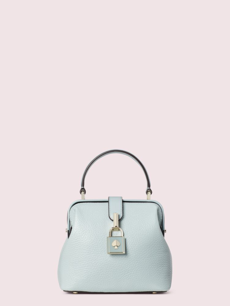 Kate spade remedy top handle online bag