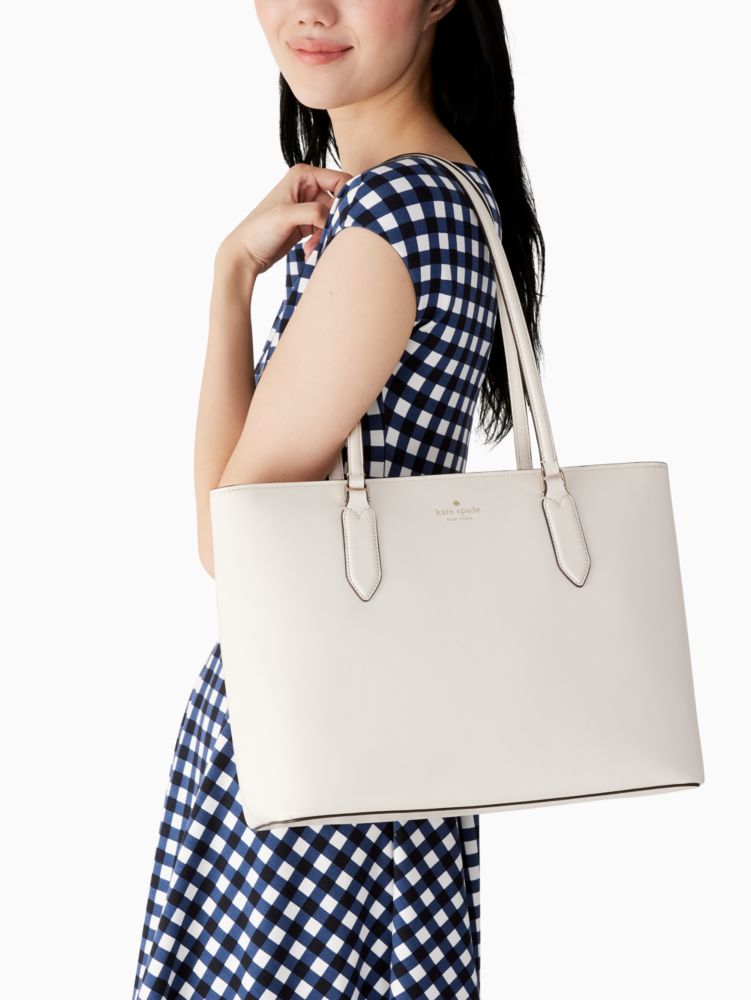 https://katespade.scene7.com/is/image/KateSpade/WKR00059_100_1?$mobileProductV3$